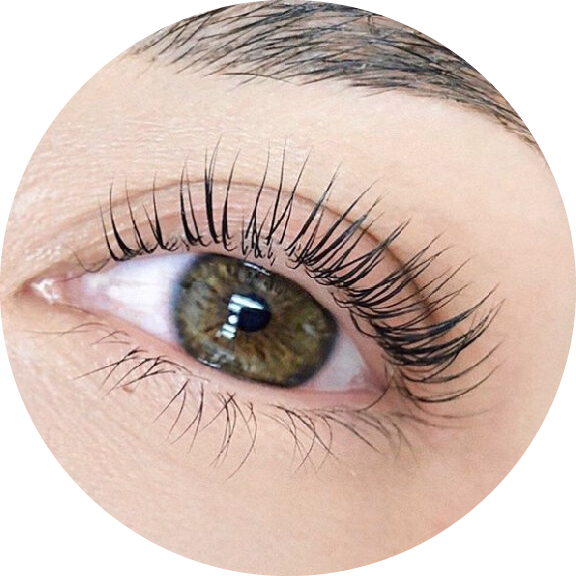 A close up of the eye with long eyelashes